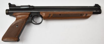 Crosman Model 1322 Medalist .22 target air pistol with shaped and chequered composite grip and