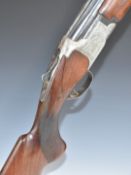Miroku 12 bore over and under ejector shotgun with engraved lock, underside, trigger guard, thumb