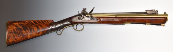 W Kelley of London flintlock blunderbuss with sprung bayonet, engraved steel lock and hammer,