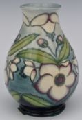 Moorcroft signed Rachel Bishop pedestal vase decorated with white flowers, dated '93, in original