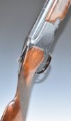 Browning 12 bore over and under ejector shotgun with engraved lock, trigger guard, underside, fences