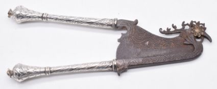 19thC Middle Eastern silver handled cutter with Damascus style blade, length 16cm