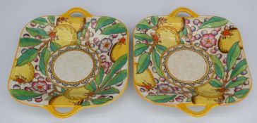 Charlotte Rhead for Crown Ducal pair of twin-handled tubelined dishes, 28 x 23cm