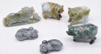 Six Chinese jade / hardstone pig figures, largest 4.5cm tall.