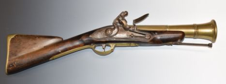 Flintlock blunderbuss with line engraved lock and hammer, brass trigger guard, butt plate and