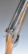 Pietta Navy Arms style 12 bore side by side percussion hammer action muzzle loading shotgun with