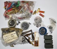 A large collection of shotgun cartridge and brass rifle cartridge cases suitable for re-loading,