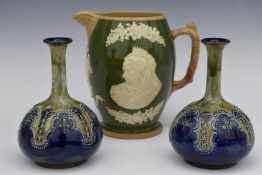 A pair of Royal Doulton pedestal vases and Copeland late Spode Queen Victoria commemorative jug,