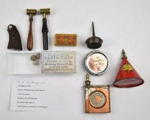 A collection of gun and shooting related accessories including shot or powder measures, Smith &