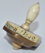 WW1 bone and brass teetotum spinning game, six sided polygon design with letters to the top and