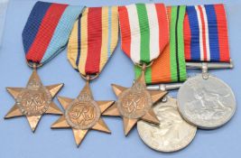 British Army WW2 medal group of five comprising 1939-1945 Star, Africa Star, Italy Medal, Defence