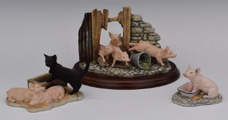 Three Border Fine Arts pig figures, in boxes, tallest 13.5cm