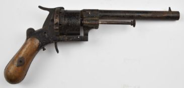 Unnamed 9mm six-shot double action pinfire revolver with shaped wooden grips and 5.75 inch rifled