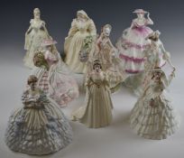 Nine Coalport figurines including limited edition examples, tallest 25cm