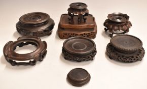 Eight 19th/20thC Chinese carved hardwood stands, largest 13 x 10cm