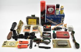 A collection of gun and shooting accessories including Deben Tracer Mini gun light, cleaning kit,