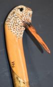 Ian James carved and painted wooden walking stick with handle in the form of a woodcock, L133cm