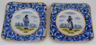A pair of Quimper faience wall plaques with figural decoration and HB monogram verso, 21.5 x 21.5cm