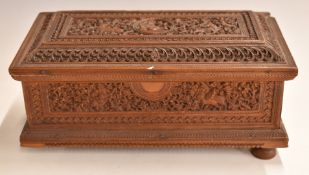 Finely carved Eastern box with figural and animal decoration, 24x13x11cm.