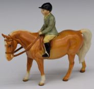 Beswick boy on a Palomino pony, H14cm