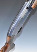 Winchester Model 1200 12 bore three-shot pump action shotgun with chequered semi-pistol grip and