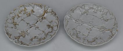 Two Meissen relief moulded cabinet plates with gilt decoration, diameter 21.5cm