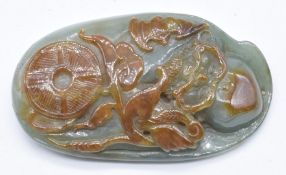 Chinese carved jade small boulder decorated with Luohan and bat, 8.5 x 5cm