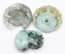 Three Chinese carved jade / hardstone roundels / boulder, largest diameter 5.5cm