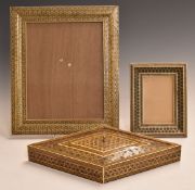 Two Persian khatam photograph frames (largest 38x32.5cm) and a similar lozenge shaped box,