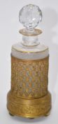 French gilt metal musical box scent bottle holder with embossed decoration, cut glass stopper and