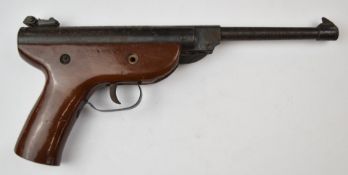 Westlake .177 air pistol with brown painted wood stock and adjustable sights, serial number 9357700.