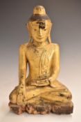 Chinese carved and gilt wood seated Buddha, possibly Ming dynasty, with purchase receipt, 35cm tall