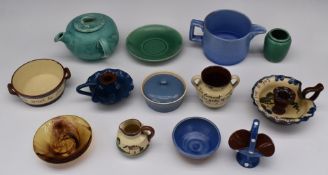 Approximately fifty six pieces of Devon / Torquay pottery including Motto Ware, Aller Vale etc,