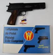 Weihrauch HW45 .177 air pistol with chequered wooden grips and adjustable sights and trigger, serial