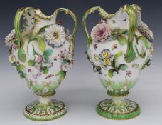 Pair of 19thC Coalbrookdale ewers with applied flower decoration, H32cm