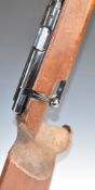 Anschutz model Match 54 .22 bolt-action target rifle with textured grip, raised cheek piece,
