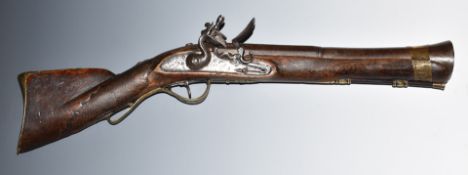 Unnamed flintlock blunderbuss with engraved lock and hammer, engraved brass trigger guard, butt