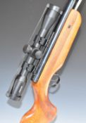 Relum Tornado .22 air rifle with chequered semi-pistol grip, raised cheek piece to the stock,