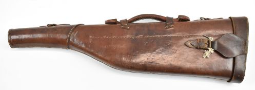 A brown leather leg of mutton shotgun case, 80cm long.