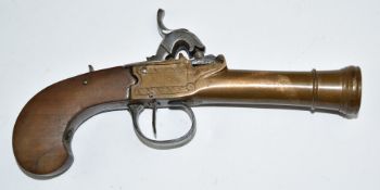 Percussion converted from flintlock hammer action pistol with engraved brass lock, thumb slide