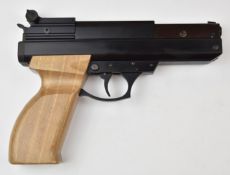 BSA .22 target air pistol with shaped wooden grips and adjustable trigger and sights, serial