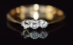 An 18ct gold ring set with two diamonds, 1.5g, size N