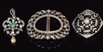 A silver brooch set with paste and a pearl, a pendant set with faux emerald paste and a drop pearl