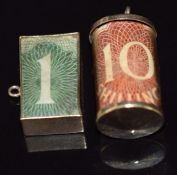 Two 9ct gold charms set with banknotes, 5.4g