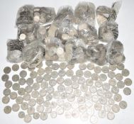 Approximately 10kg of UK post 1947 two shilling and one shilling pieces