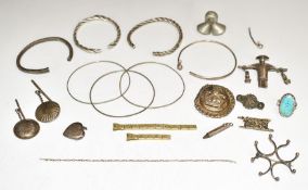 A collection of silver jewellery including three Victorian bangles, brooch, ring, Chinese brooch,