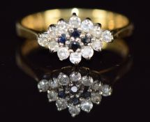 An 18ct gold ring set with sapphires and diamonds, 2.8g, size K
