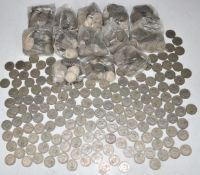 Approximately 9.18kg of UK post 1947 two shilling pieces