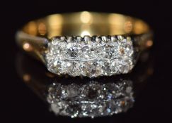 A c1910 18ct gold ring set with old cut diamonds in two rows, 4.3g, size Q