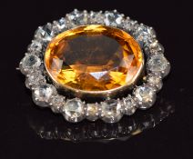 Georgian/ Victorian brooch set with an oval cut citrine surrounded by rose cut diamonds, 7.4g, 2.4 x